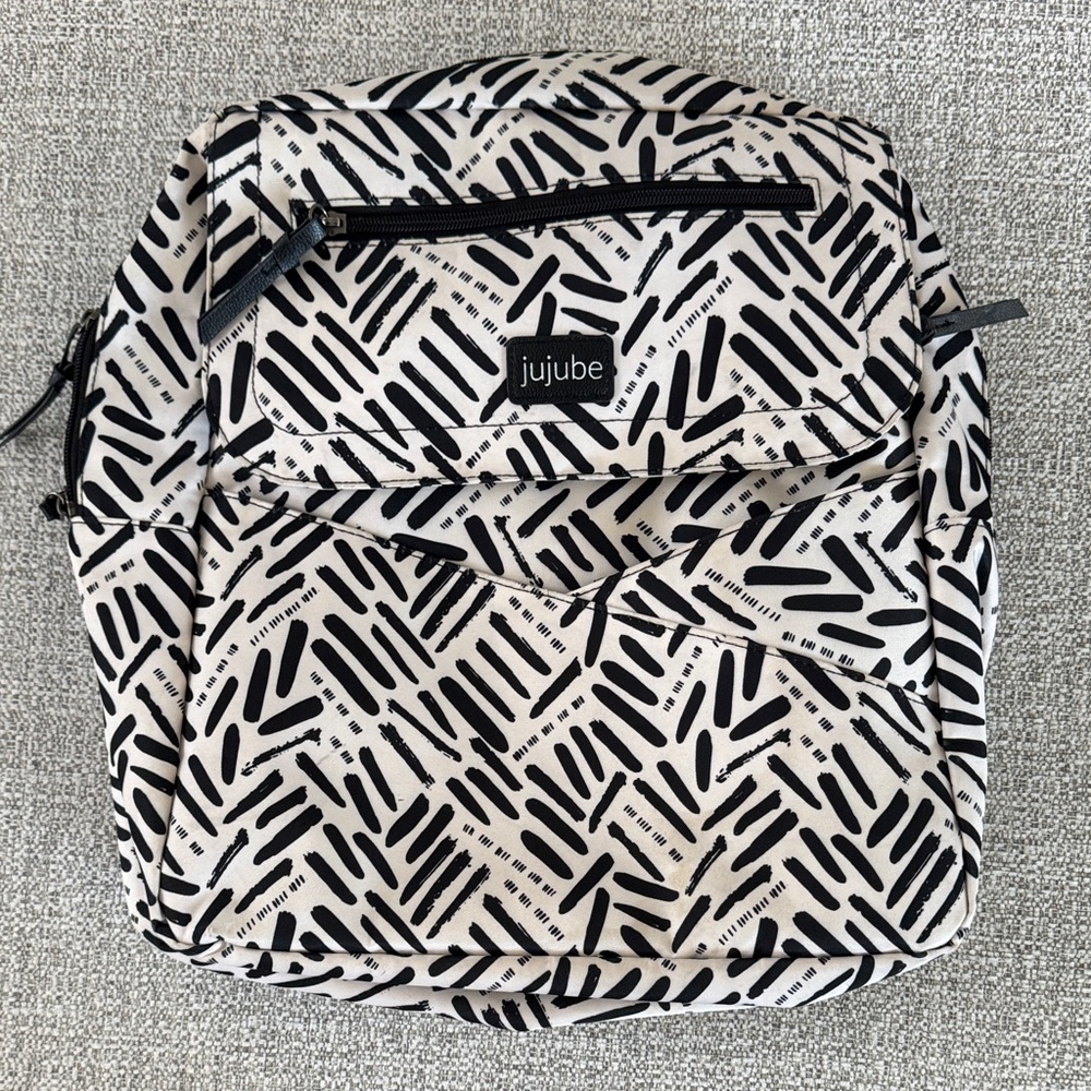 Jujube Black and White Patterned Backpack “Strike Off”